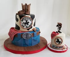 two cakes decorated with cowboy themed decorations