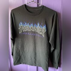 Black Long Sleeve Thrasher Skate Tee, Print On Front Only. Men’s Small 100% Cotton Nwot Bought By My Teen Son, Laundered But Never Worn. Purple Band Merch Top For Streetwear, Grunge Purple Top For Streetwear, Purple Logo Print Tops For Streetwear, Purple Crew Neck Grunge Top, Purple Relaxed Fit Shirt For Streetwear, Purple Grunge Crew Neck Top, Urban Purple Letter Print Top, Long Sleeve Purple Tops For Streetwear, Purple Long Sleeve Tops For Streetwear