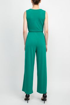 This stylish Nina Leonard V-Neck Back Zipper Sleeveless Front Tie Waist Jersey Jumpsuit is perfect for any casual occasion. Featuring a v-neck neckline, back zipper, sleeveless cut, and front tie waist, it provides all the necessary style while maintaining comfort. It's a must-have addition to any wardrobe! Spring Strapless Sleeveless Jumpsuit With Elastic Waistband, Green Stretch Strapless Jumpsuit, Versatile Sleeveless Jumpsuits For Work, Chic Strapless Sleeveless Jumpsuit With Elastic Waistband, Casual Strapless Sleeveless Jumpsuit With Elastic Waistband, Casual Strapless Jumpsuit With Elastic Waistband, Versatile Sleeveless Jumpsuits And Rompers For Loungewear, Versatile Sleeveless Jumpsuits And Rompers In Solid Color, Versatile Sleeveless Jumpsuits And Rompers