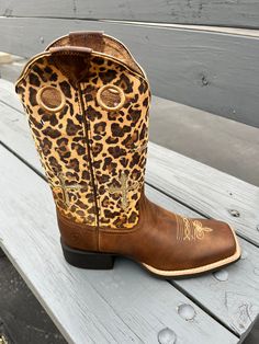 This wildly stylish boot combines always-on-trend leopard with sparkly crosses for a head-turning look. Let them shine by keeping the rest of your outfit simple—or mix in other prints and patterns to really make a statement. Features 4LR™ technology provides lightweight support as you walk and ride Synthetic lining Removable All Day Cushioning insole Duratread™ sole is extremely durable while still letting your foot flex Western Riding Boots, Racing Boots, Western Store, Western Cowgirls, Stylish Boots, Cute Outfits For School, Cowgirl Boots, Denim Outfit, Western Boots