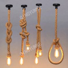 four different types of rope lights hanging from the ceiling with bulbs on each end and one light bulb in between them