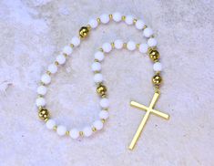 Handmade protestant prayer beads made with , natural white  Jade beads 8mm , golden Hematite  beads 10mm, findings and religious cross pendant. Protestant prayer beads  Length from the top bead to the bottom of cross is about 11 inches. Please check out our SHOP POLICY and SHOP ANNOUNCEMENT before you make any payment, thank you. http://www.etsy.com/shop/ryhcreations/policy Thanks for taking a look and stopping by my shop! Gold Rosary With 8mm Beads For Meditation, Gold Rosary With 8mm Beads For Healing, Gold Rosary For Meditation, White Spiritual Rosary Bracelet With 8mm Beads, White Rosary With 8mm Beads For Meditation, White Rosary With Round Beads For Meditation, Gold Hand-strung Spiritual Rosary, White Rosary With 8mm Beads As Gift, White 8mm Beads Rosary For Meditation