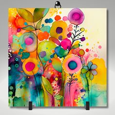 an abstract painting with colorful flowers on it