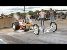 a drag car is going around the track