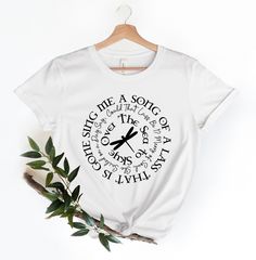 "------ CUSTOMIZE YOUR OWN ITEM ------ Sing Me A Song of A Lass That Is Gone Shirt | Outlander Book Series | Jamie Fraser Shirt | Outlander TV Series Shirt | Gift Tees Funny Shirt ------ CHOOSE YOUR SHIRT COLOR, SIZE, AND QUANTITY. ------ 1. Select the size 2. Select the primary color 3. Click \"add to cart\" and then return to the listing for each family member. 4. Add a note to seller when checking out with any special requests ------ SHIRT COLORS ------ White, Black, Deep Heather, Pink, Heath Outlander Svg Files Free, Outlander Shirt, Outlander Silhouette, Outlander Tshirt Ideas, Practical Magic T Shirts, Outlander Tee Shirts, Outlander T Shirts, Outlander Book Series, Slogan Shirts