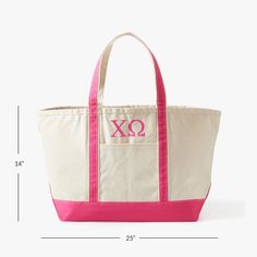 A quality take on a classic, this canvas bag makes an extra-cool statement with your house's letters embroidered on the front. Use as an everyday carry-all to get to and from class or as an easy travel tote. Makes a thoughtful gift that any sorority sister will treasure for years to come. KEY PRODUCT POINTS Made of 100% cotton canvas. Features 2 handles. Zipper closure. Imported. Everyday Bags With Embroidered Logo And Double Handle, Canvas Tote Shoulder Bag With Embroidered Logo, Canvas Shoulder Bag With Embroidered Logo And Double Handle, Canvas Softback Bag, White Travel Bag With Embroidered Logo, Pink School Bag With Letter Patch, Pink Bags With Embroidered Logo For Daily Use, Canvas Bags With Embroidered Logo And Double Handle, Pink School Bags With Letter Patch