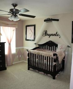 a baby's crib and dresser in a room with white carpeted walls