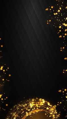 an abstract black and gold background with sparkles in the dark, it looks like something out of space