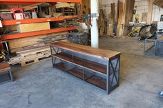 a room filled with lots of different types of wood and metal furniture on shelves next to each other