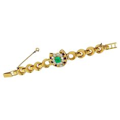 This stunning French vintage bracelet made approximately in the 1980s, is the perfect blend of timeless elegance and exquisite design. Crafted from 18k yellow gold, it features a captivating square-cut emerald at its center, surrounded by 11 round diamonds with a total carat weight of approximately 3.85 carats, and six amethysts that add a beautiful pop of color. The diamonds are estimated as H-I color, VS-SI clarity. The emerald is of a very good quality, with a vibrant green color and a high level of brilliance. The origin is estimated as Zambian. The diamonds are perfectly cut to maximize their sparkle and fire, and the amethysts add a rich, deep purple hue to the overall design. The prong settings of the diamonds allow light to enter from all angles, creating a brilliant and eye-catchi Luxury Yellow Gold Emerald Cut Bracelet, Classic Emerald Bracelets For Formal Occasions, Classic Formal Emerald Bracelets, Elegant Yellow Gold Bracelet With Emerald, Elegant Yellow Gold Diamond And Emerald Bracelet, Timeless Green Bracelet For Formal Occasions, Timeless Green Bracelets For Formal Occasions, Luxury Gold Emerald Cut Bracelets, Classic Gold Bracelets With Emerald