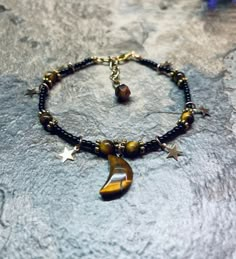 Celestial moon and star crystal anklet with tigers eye and extender ✨ Knitting Moodboard, Crystal Bracelet Ideas, Geneva Ny, Tigers Eye Crystal, Anklet Gold, Handmade Anklets, Grunge Accessories, Star Crystal, Crystal Anklet