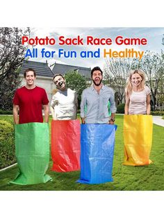 three men and two women are standing in the grass with colorful bags on their heads