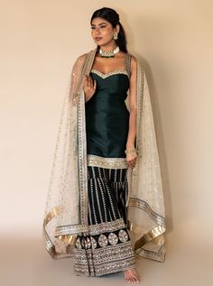 Shop Indian bridal sharara in USA: This stunning bottle green & cream bridal sharara with sequin & threadwork is perfect for your nikah. Indian wedding wear store in Fremont Bay Area Shipping Worldwide to UK, USA, Canada, Germany, Australia. Green Palazzo Set For Wedding During Diwali, Green Palazzo Set For Wedding And Diwali, Green Floor-length Palazzo Set For Wedding, Green Cutdana Sharara For Wedding, Green Sharara With Gota Work For Reception, Green Palazzo Set With Gota Work For Wedding, Green Zari Work Palazzo Set For Wedding, Green Sharara With Traditional Drape For Wedding, Green Semi-stitched Sharara For Wedding