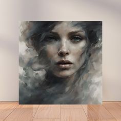 an abstract painting of a woman's face on a wooden floor in front of a white wall