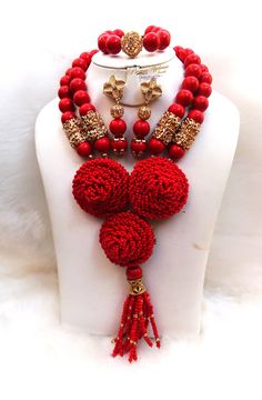 Beautiful Red Gold New Latest Design African Red Beads Bridal Wedding Jewelry Necklace Set Beads can be customised to your specification and color Comes with Necklace, earring and bracelet Elegant Red Beaded Jewelry Set, Red Jewelry With Faceted Beads, Red Polished Beads Jewelry Sets, Red Jewelry Sets With Polished Round Beads, Red Jewelry Sets With Round Beads For Gift, Festive Red Jewelry Sets With Polished Beads, Festive Red Polished Bead Jewelry Sets, Elegant Red Beads For Wedding, Elegant Red Beaded Bridal Necklace