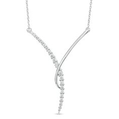 Bring sleek sophistication to any look with this marvelous diamond "Y" necklace. Fashioned in cool 10K white gold, this stylish choice showcases a polished curved ribbon overlapping a sparkling curved row of diamonds in a chic "Y" shape. Radiant with 1/3 ct. t.w. of diamonds and a brilliant buffed luster, this design suspends centered along an 18.0-inch cable chain, with an additional closure ring at 16.0 inches, that secures with a lobster claw clasp. Modern Mangalsutra, Silver Diamond Necklace, Diamond Anniversary Bands, Pearls Jewelry, Y Necklace, Diamond Anniversary, Bridal Look, Anniversary Bands, Diamond Band