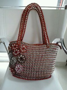 a handbag sitting on top of a white counter