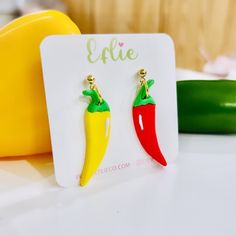 Super fun Hot Spicy Peppers! perfect earrings for farmer market or just work in the garden:)  Measuring approx 2 inch drop and 0.5 inch width at its widest point.  Polymer clay earrings. Super lightweight, stylish and durable. Made with hypoallergenic stainless steel backs and brass or gold plated components. Please note that, due to lighting effects and individual monitor settings, color tones may show up a little differently on different computers. Because all our pieces are handcrafted, there Farmer Market, Funny Earrings, Market Jewelry, Gardening Gift, Hot Pepper, Hot Spicy, Color Tones, Stuffed Hot Peppers, Garden Gifts