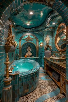 a fancy bathroom with a large jacuzzi tub in the center and blue tiles on the walls