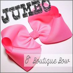 two large pink bows with the words jumbo on it and an image of one big pink bow