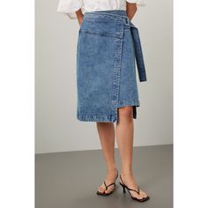 Blue denim (100% Cotton). A-line. Tie closure. 28.5" from waist to hemline. Imported. Workwear Denim Blue Skirt With Belt Loops, Spring Medium Wash Denim Skirt With Belt Loops, Spring Denim Skirt With Belt Loops In Medium Wash, Denim Skirt With Belt Loops For Work, Mid-rise Denim Skirt For Workwear, Spring Denim Skirt With Belt Loops In Straight Shape, Relaxed Denim Skirt For Work, Denim Wrap Skirt, Rent The Runway