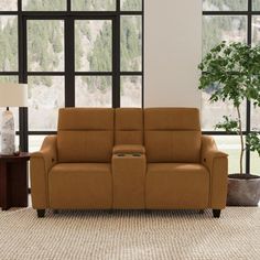 a living room scene with focus on the reclining sofa