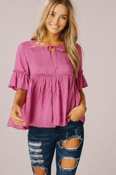 (1) Hollie Top – The Nod Boutique Pink Ruffle Sleeve Tops For Summer, Cute Ruffled Flutter Sleeve Blouse, Cute Flutter Sleeve Blouse For Summer, Cute Summer Blouse With Flutter Sleeves, Cute Spring Blouse With Bow, Summer Pink Flutter Sleeve Tops, Pink Flutter Sleeve Top For Brunch, Cute Ruffle Hem Blouse For Spring, Flowy Pink Tops With Ruffle Sleeves