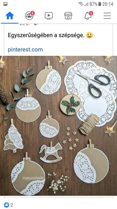 an instagram page with some paper cutouts and scissors on it's side