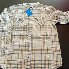 Columbia Men’s Coal Run Trail Exs Flannel Shirt. This Is A Lighter Weight Than Traditional Flannel, Soft. Features Sleeves That Can Be Rolled And Buttoned Up. Pale Yellow/Beige With Grey And Slate/Grey Blue Plaid. 100% Cotton Nwt Casual Yellow Cotton Flannel Shirt, Casual Yellow Button-up Flannel Shirt, Cotton Button-up Flannel Shirt For Daywear, Gray Cotton Button-up Flannel Shirt, Vintage Blue Flannel Shirt With Button Closure, Brown Button-up Flannel Shirt With Pockets, Columbia Shirt, Blue Flannel, Cotton Patchwork Button-up Flannel Shirt