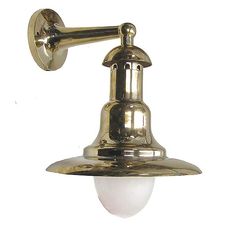 an old fashioned brass wall light with a white glass bulb on the side and a metal arm