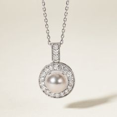 Experience Timeless Elegance with Akoya Pearls Material: Akoya Pearl, 18K white gold and diamond (S925 Silver Chain) Akoya pearl saltwater cultured pearl 1 pearl 6.5-7.0mm 21 diamonds about 0.315 carats in total Size of Pendant: 12.0*18.5 mm Handpicked of every pearl, only the top 1% of pearls are selected Handcrafted Lifetime warranty Classic Pearl Diamond Necklace For Formal Occasions, Platinum Hallmarked Necklace, Classic Formal Pearl Diamond Necklace, Classic Diamond Necklace With Pearl Chain For Formal Events, Luxury Pearl Chain Necklace For Anniversary, Elegant Silver Pearl Necklace For Formal Occasions, Elegant Hallmarked Diamond Necklace For Formal Occasions, Classic Akoya Pearl Diamond Necklace For Anniversary, Luxury Akoya Pearl Necklace For Anniversary