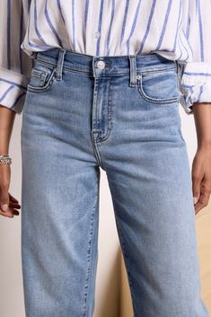 A cropped wide leg creates the chic silhouette of these 7 For All Mankind jeans. Perfect for day-to-night wear, the Alexa features raw ankle-length hems and soft stretch denim fabric in a faded blue wash. | 7 FOR ALL MANKIND Women's Cropped Alexa w Raw Hem Jeans, Size 27, Blue Article On Raw Hem Pants, Stretch Denim Fabric, Raw Hem Jeans, Hem Jeans, Fashion 101, Night Wear, 7 For All Mankind Jeans, Fall Shopping, Tee Dress