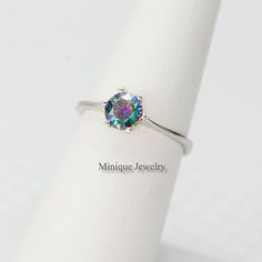 "We proudly offer the minimalist Alexandrite color 6 mm round gemstone ring in sterling silver. You have the option of making a set of trio, ring, necklace, and earrings. This dainty looking with a significant round color-changing gemstone ring is tarnish-resistant and rhodium plated. Perfect gift for Christmas, Valentine's Day, Mother's Day, Aniversary, and just for gifting. Alexandrite is June Birthstone. 🎀 Dimensions: Gemstone width: 6 mm (1/4 \") 🎀 Please note that pictures are magnified t Anniversary Midi Rings With Prong Setting, Minimalist Sterling Silver Solitaire Crystal Ring, Minimalist Solitaire Crystal Ring In Sterling Silver, Birthstone Midi Rings, Minimalist Round Cut Crystal Gemstone Ring, Midi Promise Rings With Prong Setting, Minimalist Round Crystal Promise Ring, Minimalist Round Solitaire Jewelry, Minimalist Round Cut Crystal Ring