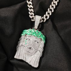 Kick your personal style up a notch with this iced-out Jesus piece pendant. This hip-hop rapper-style men's necklace bears a stunning Jesus piece design and is ideal for parties, performances, or as a gift for a special person. This iced-out necklace is made with copper, micro-paved AAA CZ stone, and has a gorgeous silver-gold color. Get hold of this necklace now!Specifications Style: Hiphop/Rock Shape\pattern: JESUS PIECE Product Style: Hip Hop Rapper Product Shape: JESUS PIECE Pendant Size: 85 White Pendant Necklace For Streetwear, White Bling Necklaces For Streetwear, Iced Out Pendant Necklace For Streetwear, Streetwear Iced Out Pendant Necklace, Cuban Link Rope Chain Necklace For Streetwear, Streetwear Cuban Link Rope Chain Necklace, Big Gold Chains, Air Force One Shoes, Jesus Piece