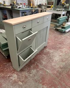 a kitchen island with drawers in a shop