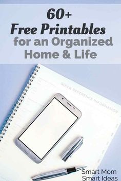 a notepad, pen and cell phone on top of a notebook with the text 60 free printables for an organized home & life