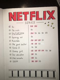 a notebook with the words netflix series written in red and black on top of it