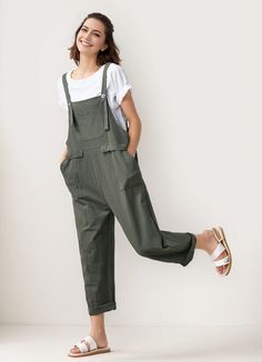 "Convenient pockets add functionality, making these overalls a must-have for your wardrobe. A casual chic look has never been so comfortable. FEATURES - 100% linen  -Button detail  -Front and back Two pockets -Loose fit -Over sized Fit -Ankle Length -For Summer, spring, autumn -Wash by hand or machine with cold water * The model is 165 cm (5′ 5″) tall with a 80 cm (31.5\") bust, 66 cm (26\") waist. She is wearing the overalls in size XS. ★★Bespoke Order Service If you Request other color Request the length Your height is not between 155 cm- 175 cm Your weight is not between 47 kg -77 kg I can do it for you, It will need some extra fee depending on on your need. Contact with me for more detail. ★★Get your size in Size Chart with your body measurement https://www.etsy.com/listing/794055682 ★ Casual Relaxed Fit Jumpsuits With Slip Pockets, Solid Cotton Jumpsuits And Rompers With Pockets, Spring Overalls With Slip Pockets And Relaxed Fit, Cotton Jumpsuits And Rompers With Pockets, Utility Jumpsuit With Bib Front And Pockets, Utility Style Khaki Jumpsuits And Rompers With Pockets, Utility Jumpsuits And Rompers With Bib Front And Pockets, Utility Jumpsuits With Side Pockets And Bib Front, Khaki Utility Jumpsuit With Pockets