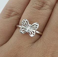 Introducing our exquisite Butterfly Silver Handmade Ring, specially designed for kids! This charming piece of jewelry captures the beauty and grace of a butterfly in every detail. Crafted with love and care, this ring is not just an accessory, but a precious keepsake that will adorn your child's hand with a touch of elegance. Key Features: 1. **Handmade Craftsmanship Each ring is meticulously handcrafted by skilled artisans, ensuring a level of quality and attention to detail that machine-made j Kids Rings, Butterfly Ring, Silver Rings Handmade, Pure Silver, Timeless Pieces, Handmade Ring, Handmade Silver, Ideal Gift, 925 Silver