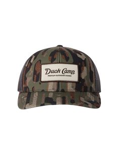 Look good, hunt good in a Duck Camp signature camo hat made of 100% Recycled Materials. Good for you, good for habitat. - Recycled materials make this hat better for everyone without sacrificing performance features- 6-panel structure- Snap back adjustment Outdoor Camouflage Baseball Cap, Camouflage Snapback Hat For Outdoor Activities, Camouflage Flat Bill Hat For Outdoor, Camouflage Trucker Baseball Cap For Outdoor, Outdoor Camouflage Snapback Baseball Cap, Outdoor Camouflage Trucker Baseball Cap, Camouflage Curved Brim Hat For Camping, Camouflage Snapback Hat For Outdoor, Camouflage Trucker Hat For Outdoor