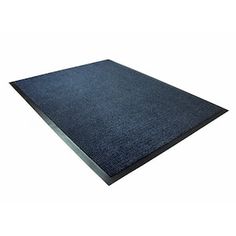 a blue rug on top of a white floor with a black border around the edges