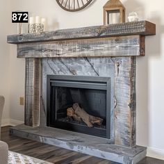 a fireplace with a clock on the wall above it