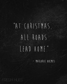 a black and white photo with the words, at christmas, all roads lead home