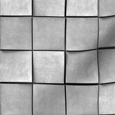 an image of some sort of wall made out of squares and rectangles in black and white