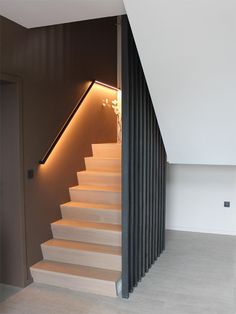 there is a stair case with lights on it