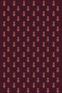 a red and pink background with pineapples on it