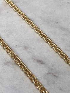 "METAL: 14kt Yellow Gold LENGTH: 20\" WIDTH: 3mm WEIGHT: 19.1 grams This very well made Solid Round Wheat Necklace has a secure barrel clasp with a fig 8 safety clasp. This necklace is very flexible,strong and comfortable to wear. FREE SHIPPING REGULAR RETAIL PRICE: $2,390.00" Wheat Necklace, Wheat Design, Mens Wedding Bands, Gold Hoop, Gold Hoop Earrings, Wedding Men, Charm Pendant, Fig, Wheat