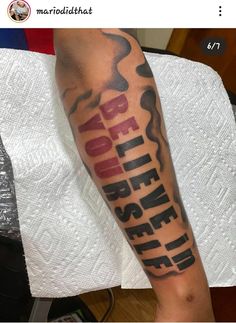 a person with a tattoo on their leg that says, no one else left behind