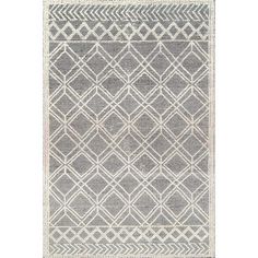 a gray and white rug with an intricate design