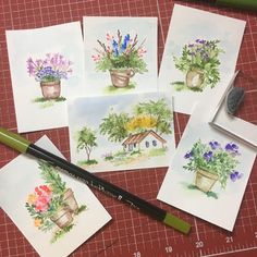 four watercolor cards with flowers in pots on them